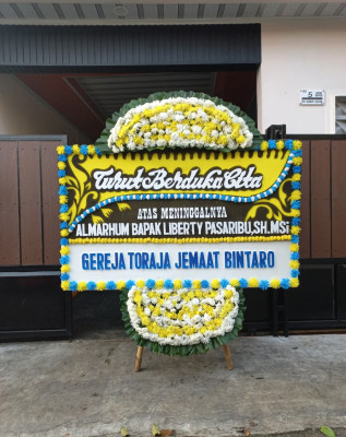 Papan Bunga Duka di Tegal Angus